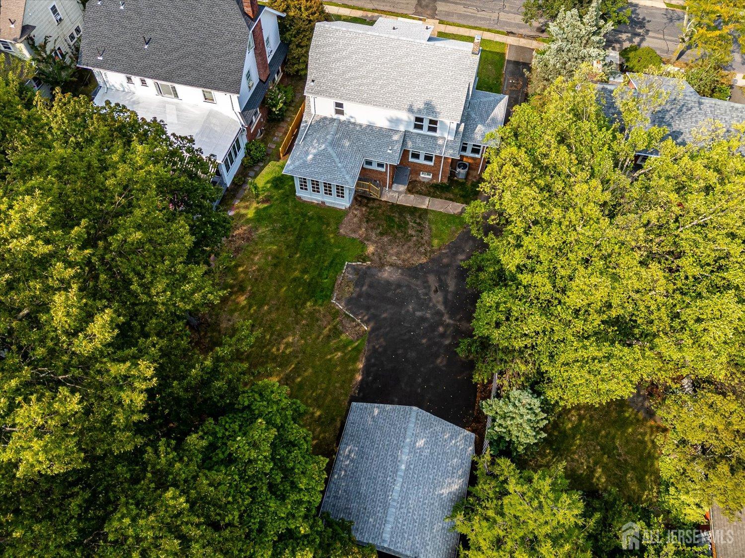 140 Oakview Avenue Maplewood, NJ 07040 - Photo 64 of 67 an aerial view of a house with a yard