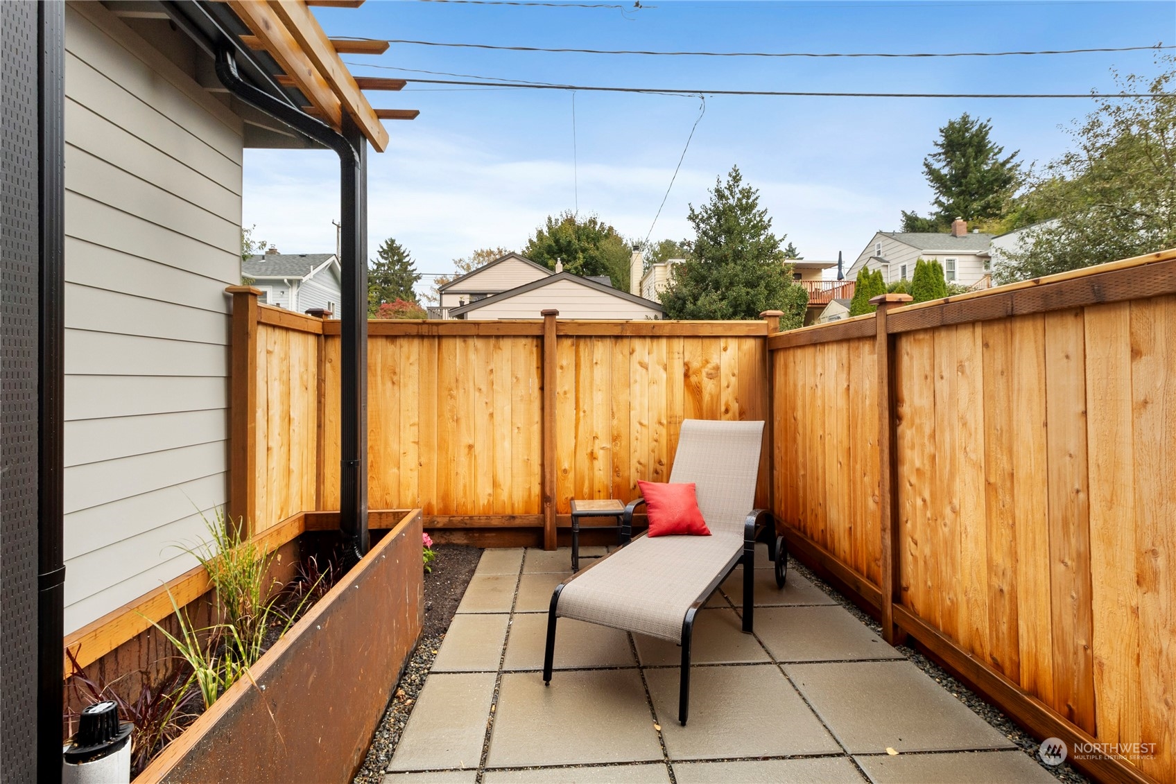 8410 17th Avenue Southwest, Unit B Seattle, WA 98106 - Photo 12 of 18 a balcony with furniture and a potted plant