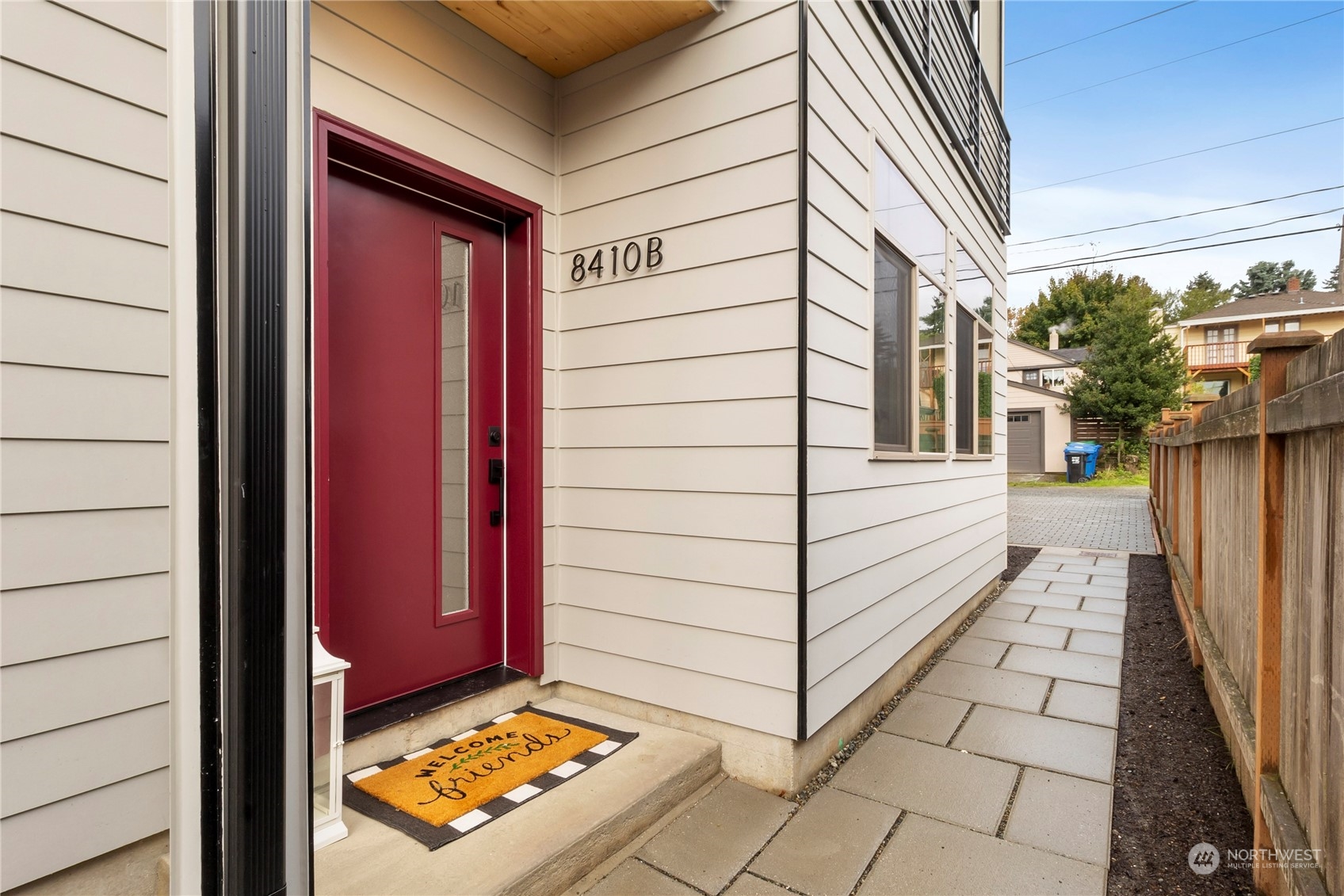 8410 17th Avenue Southwest, Unit B Seattle, WA 98106 - Photo 14 of 18 a view of a house with backyard and sitting area