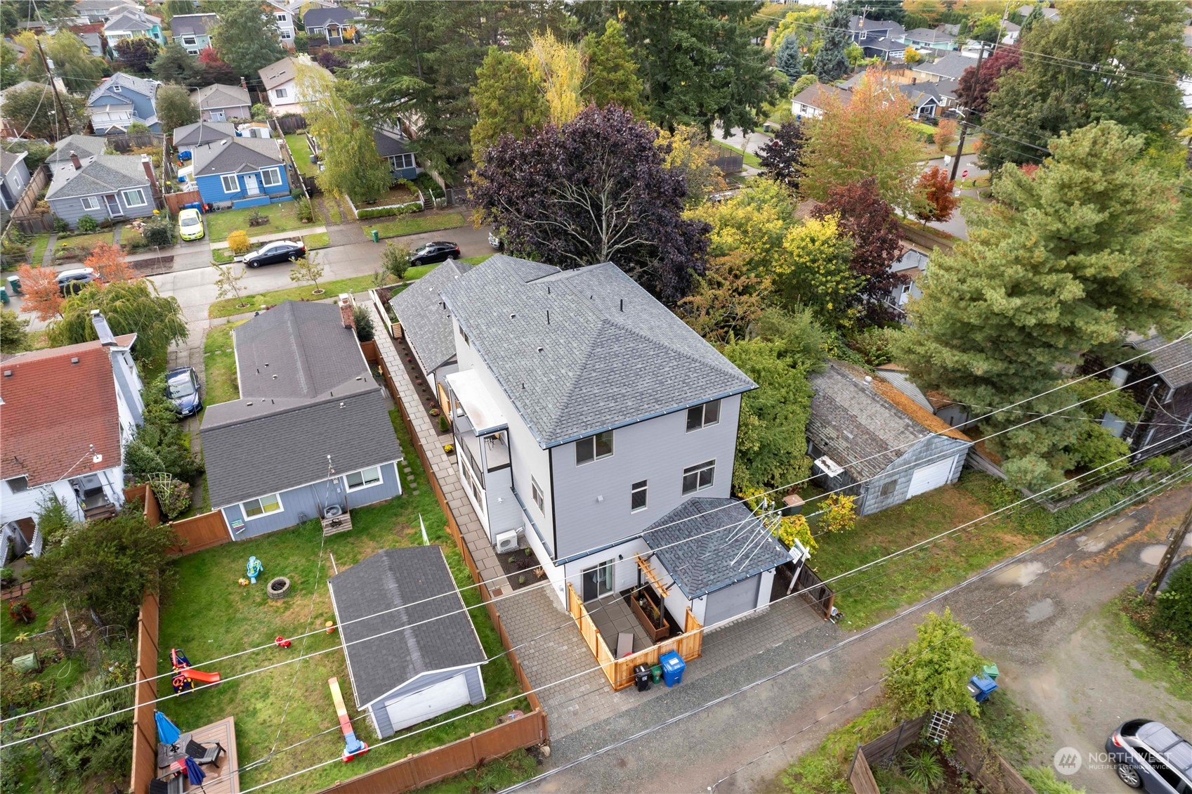 8410 17th Avenue Southwest, Unit B Seattle, WA 98106 - Photo 16 of 18 an aerial view of residential houses with outdoor space