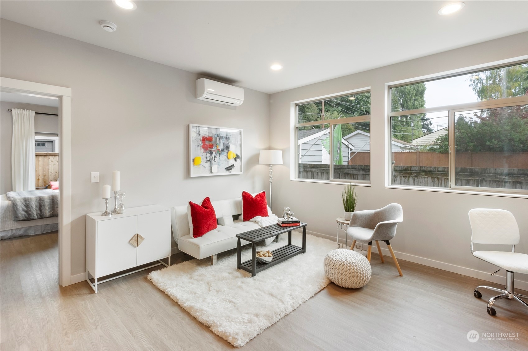 8410 17th Avenue Southwest, Unit B Seattle, WA 98106 - Photo 4 of 18 a living room with furniture and a large window
