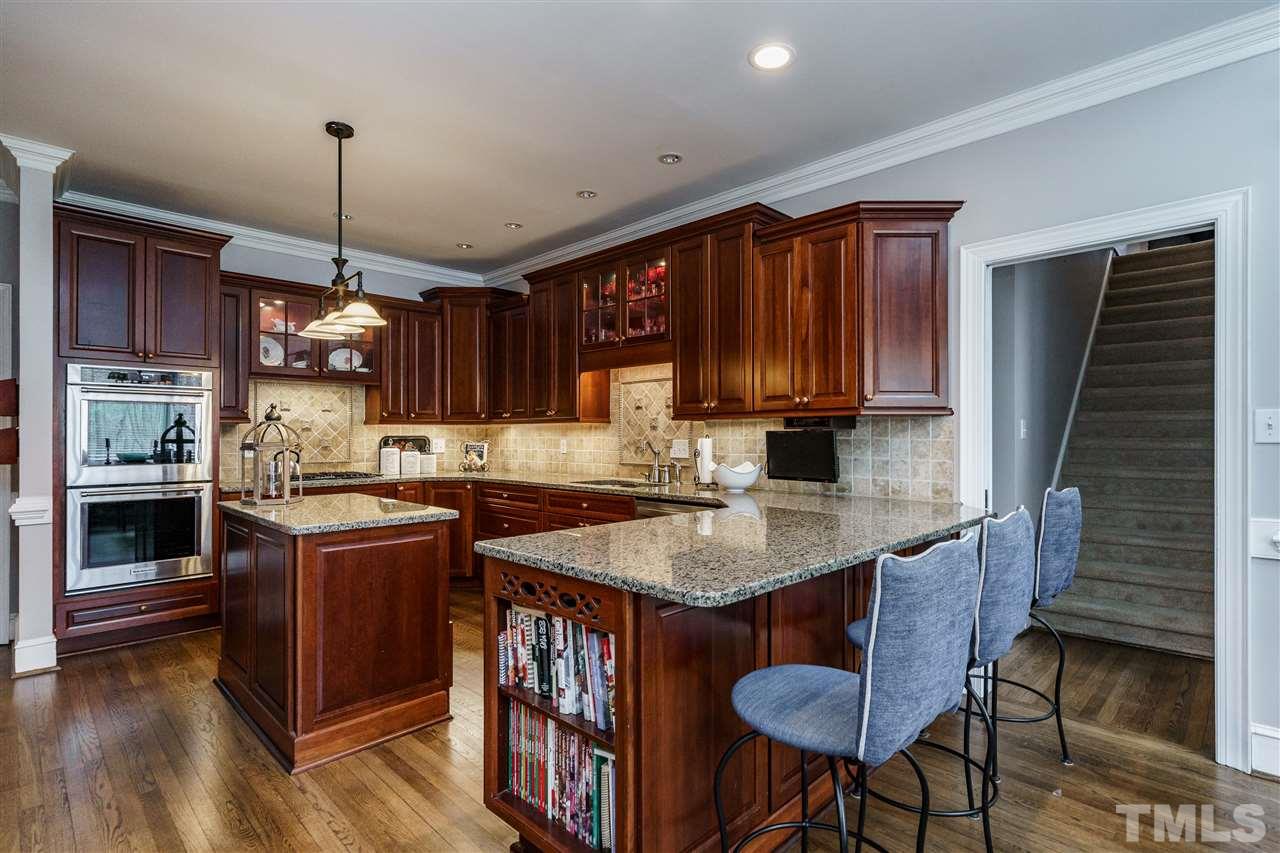 10709 Dunhill Terrace Raleigh, NC 27615 - Photo 13 of 30 Eat in bar for casual meals or a gorgeous breakfast area makes room for more sit down gatherings. Flexible for everyday living!