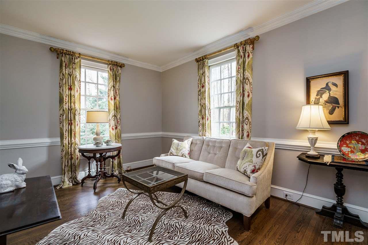 10709 Dunhill Terrace Raleigh, NC 27615 - Photo 5 of 30 Formal living room gives you the extra space for entertaining the most special friends and family. There is no need to change a thing. It would be effortless to settle into this home.