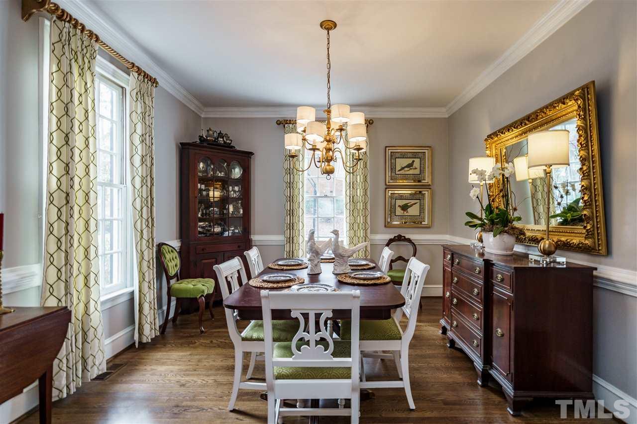 10709 Dunhill Terrace Raleigh, NC 27615 - Photo 6 of 30 Picturing friends and family gathered in this beautiful formal dining room isn't hard to do.
