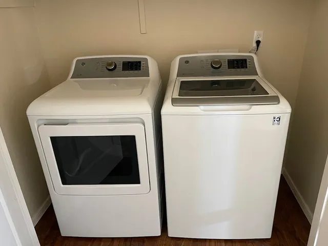 a utility room with dryer and washer