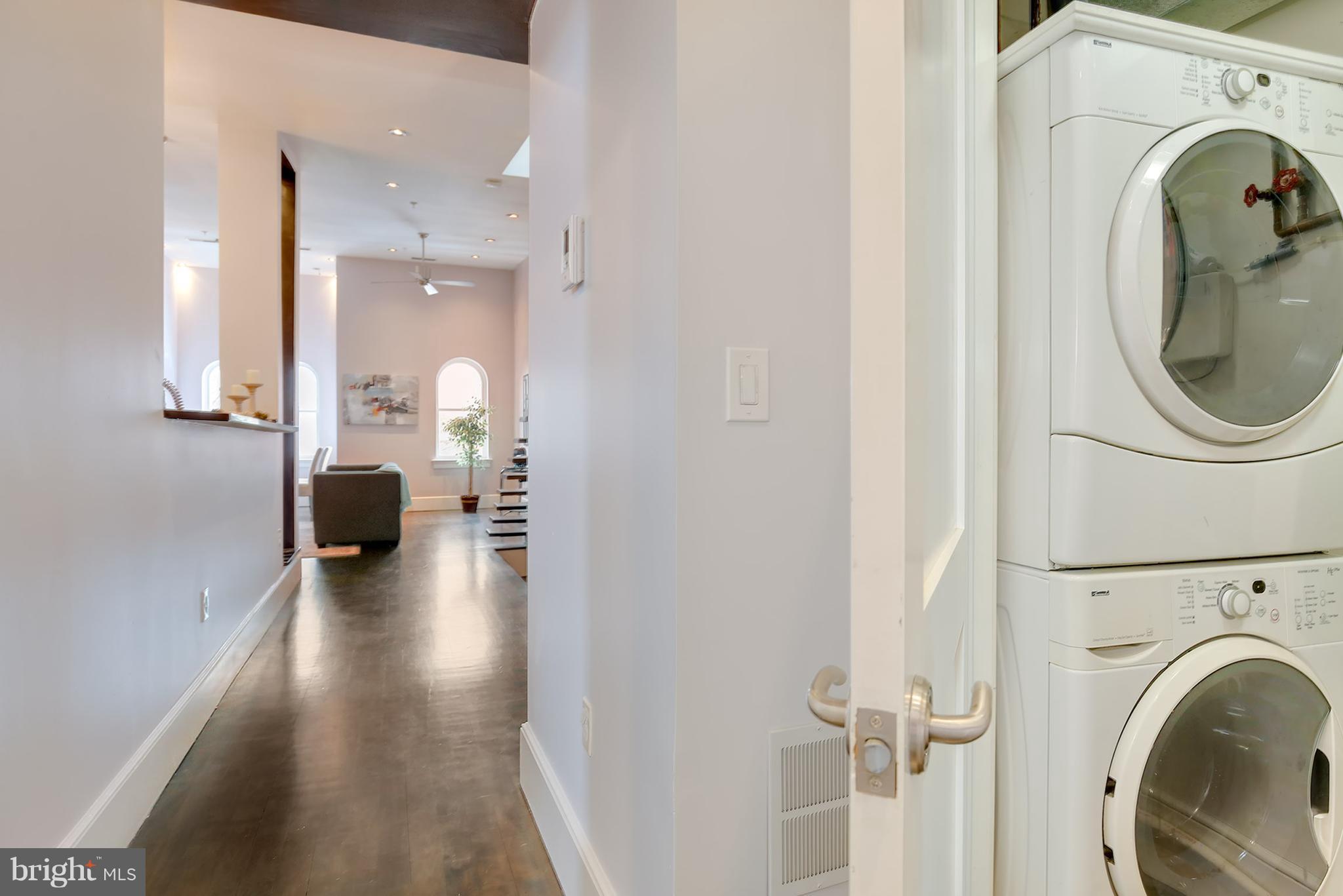 1433 R Street Northwest, Unit 4 Washington, DC 20009 - Photo 17 of 27 a view of a hallway with washer and dryer