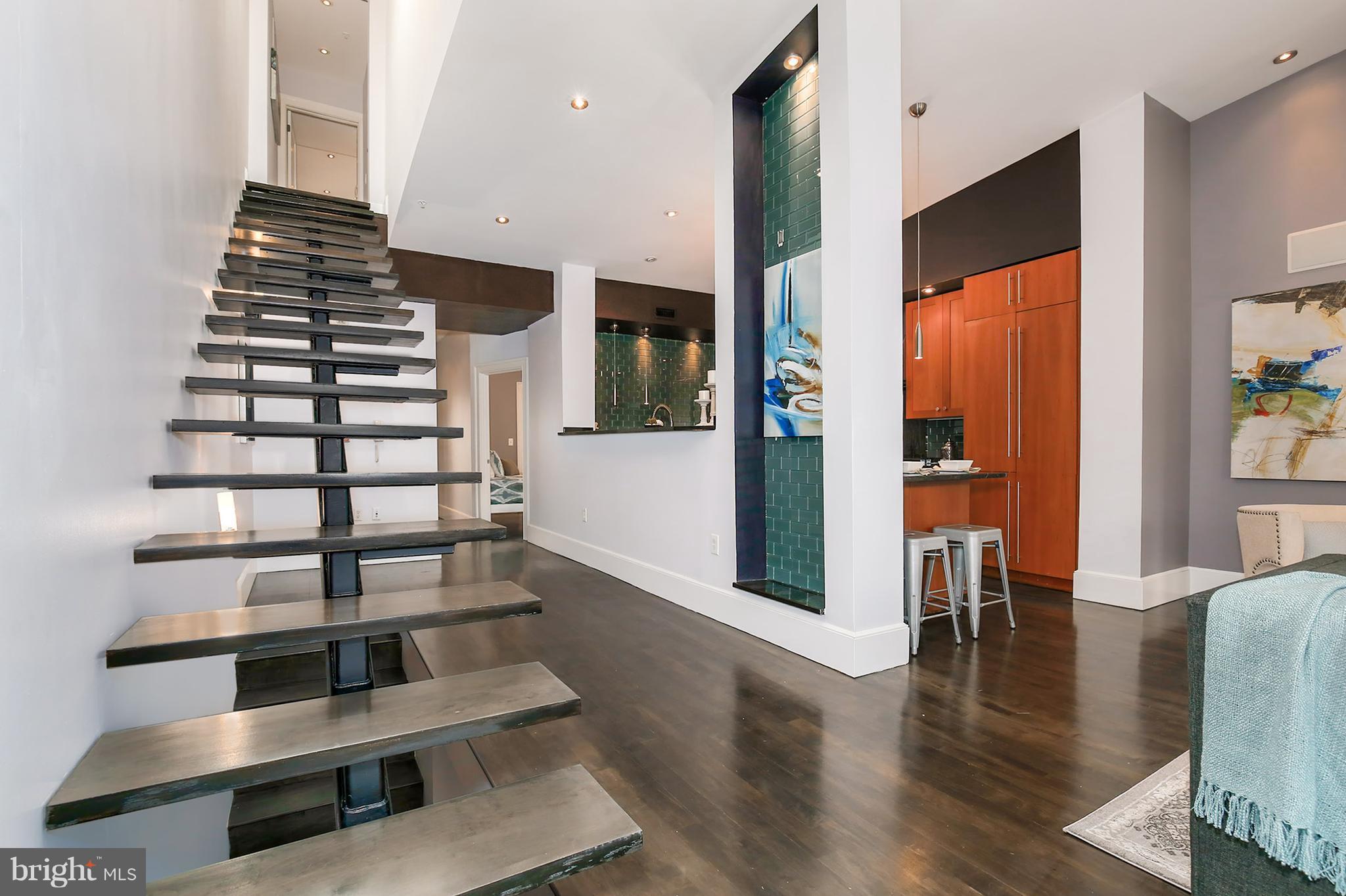 1433 R Street Northwest, Unit 4 Washington, DC 20009 - Photo 18 of 27 a view of entryway and hall with wooden floor