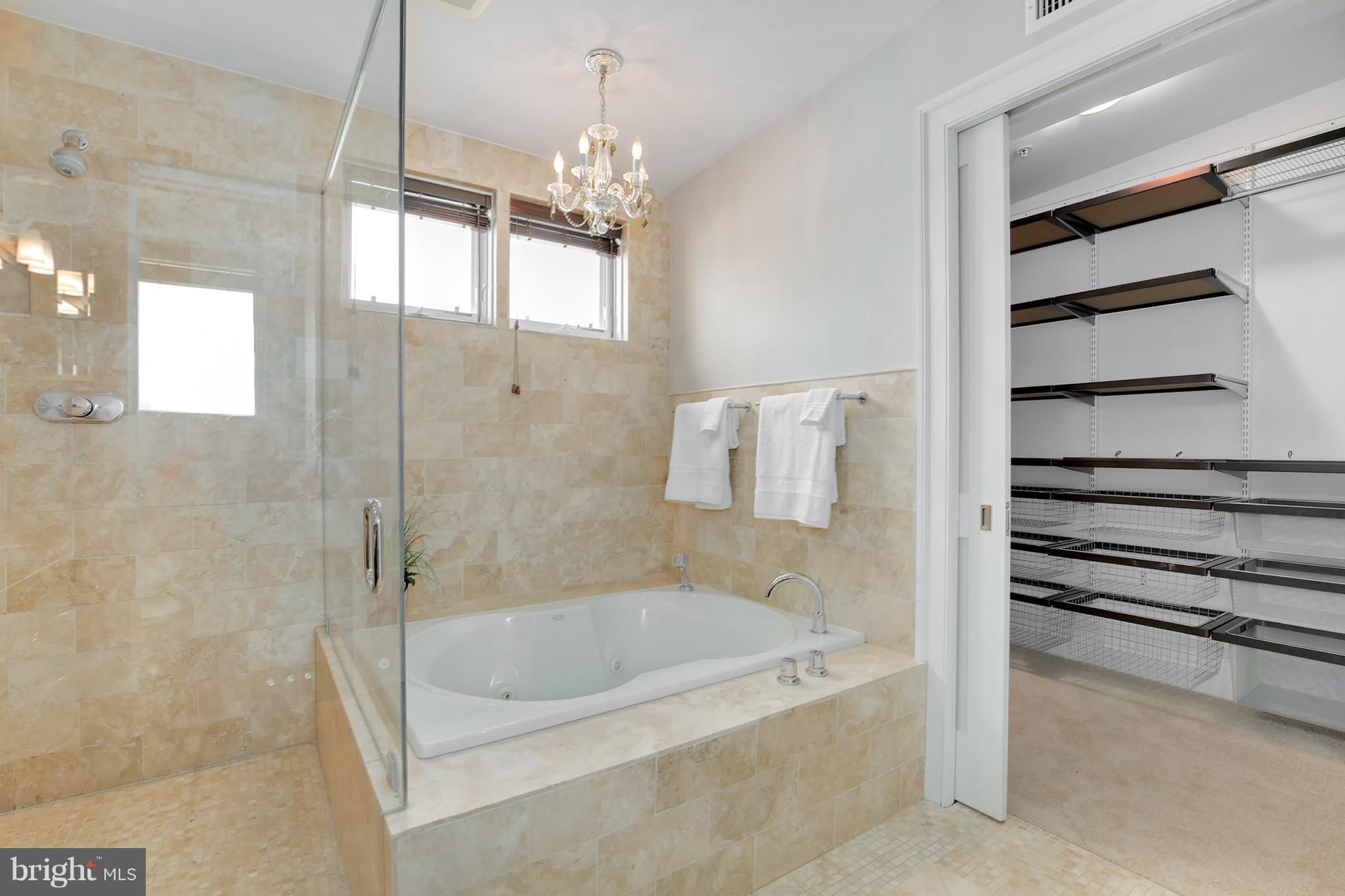 1433 R Street Northwest, Unit 4 Washington, DC 20009 - Photo 23 of 27 a bathroom with a bathtub and a shower