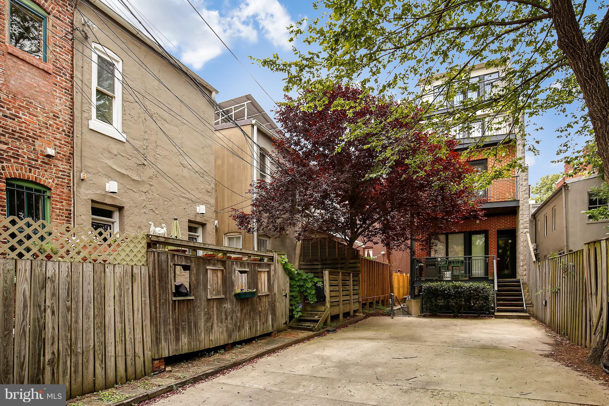 1433 R Street Northwest, Unit 4 Washington, DC 20009 - Photo 27 of 27 a view of a house with a large tree