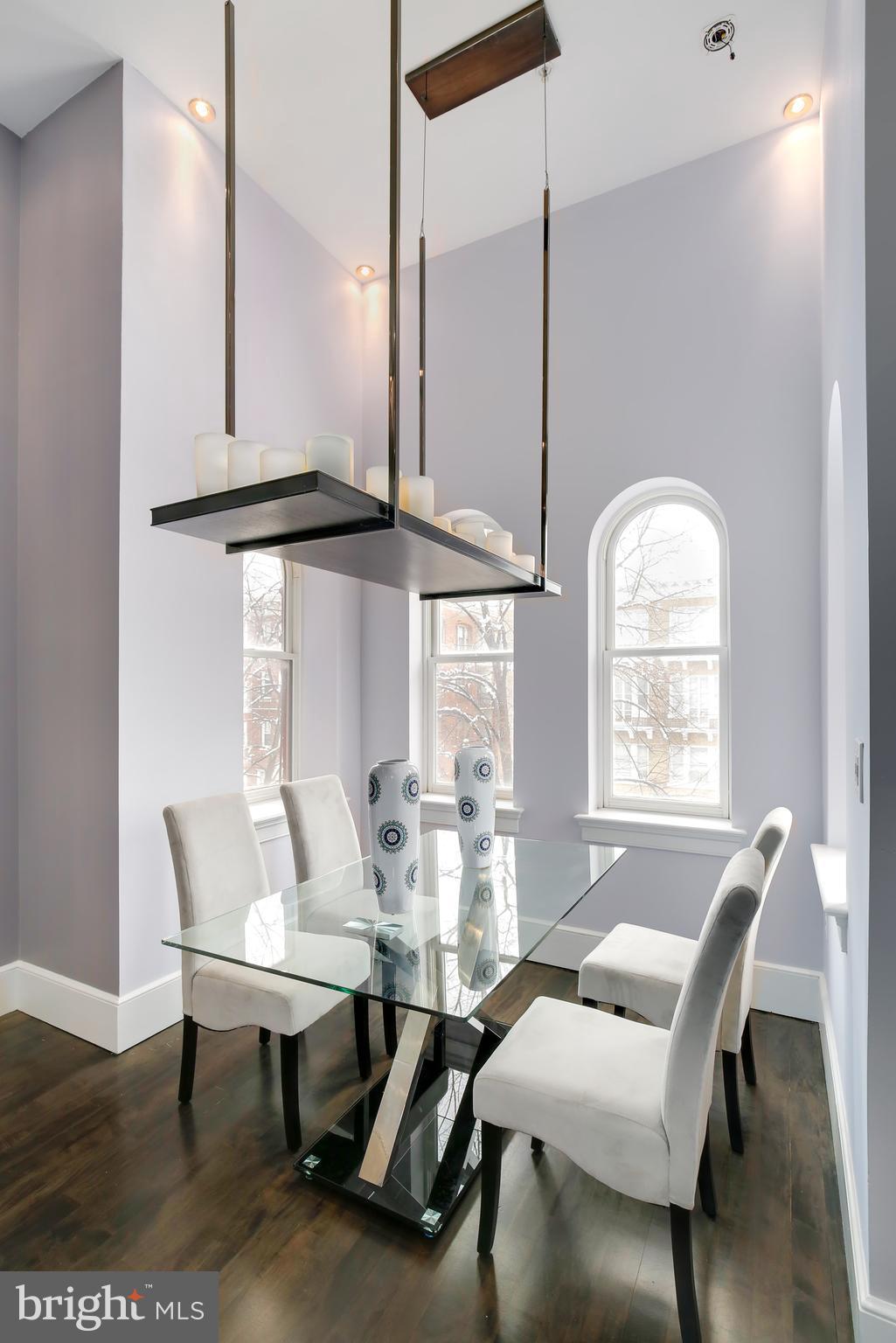 1433 R Street Northwest, Unit 4 Washington, DC 20009 - Photo 5 of 27 a view of a dining room with furniture window and wooden floor