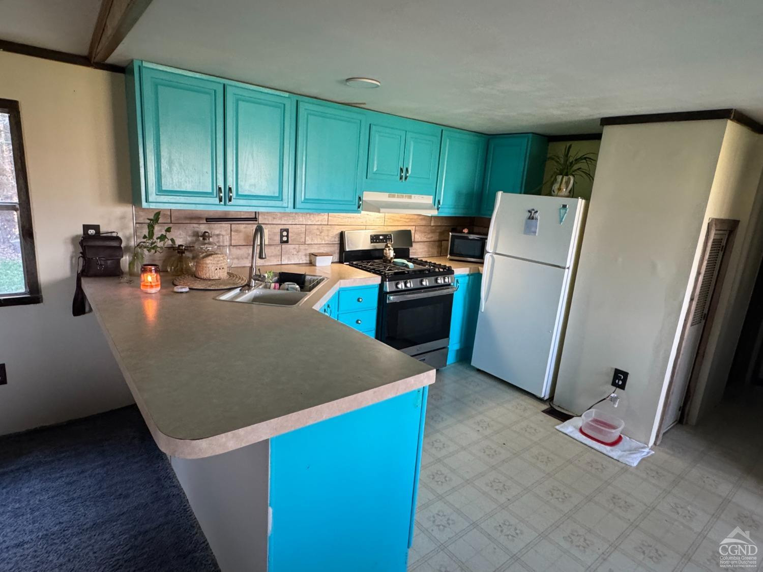 111 Cross Road Gilboa, NY 12076 - Photo 12 of 48 a kitchen with stainless steel appliances granite countertop a refrigerator a sink a stove and dishwasher