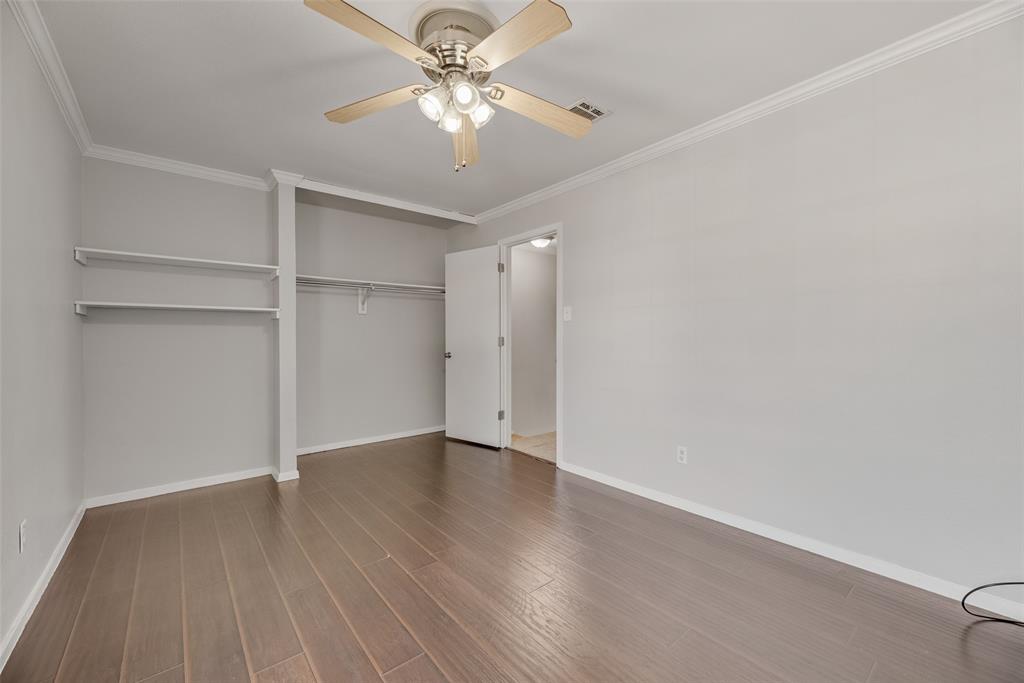 43 Abbey Road Euless, TX 76039 - Photo 18 of 22 wooden floor in an empty room