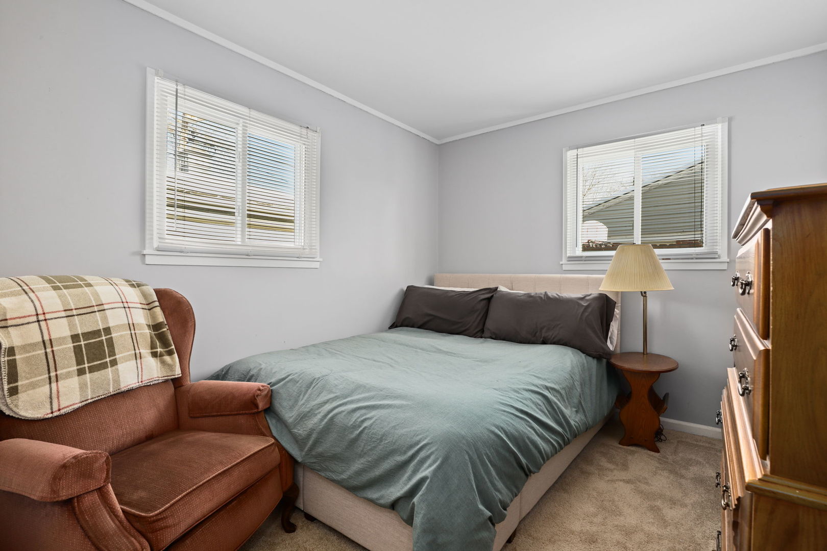 712 South Wayne Place Wheeling, IL 60090 - Photo 15 of 22 a bedroom with a bed and wooden floor