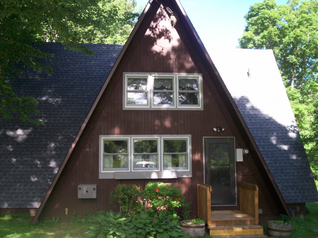 38 Brunelle Road Heath, MA 01340 - Photo 1 of 6 a front view of a house with a yard
