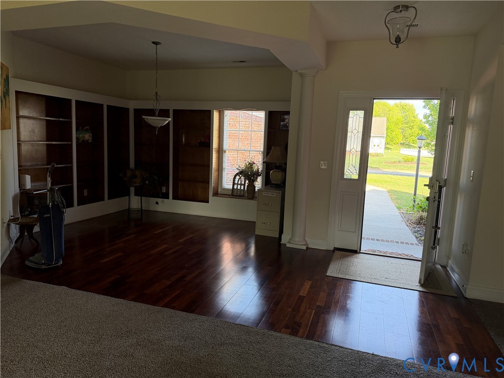 225 Lighthouse Pointe Hopewell, VA 23860 - Photo 11 of 23 wooden floor in an empty room with a window