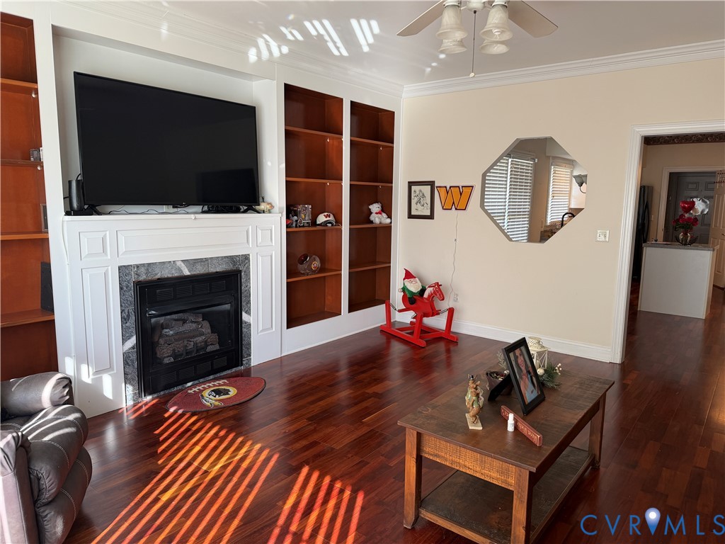225 Lighthouse Pointe Hopewell, VA 23860 - Photo 22 of 23 a living room with furniture fireplace and flat screen tv
