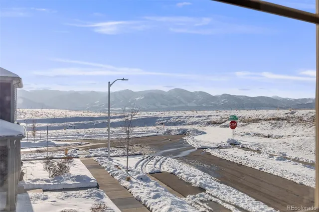 a view of a road with an ocean view
