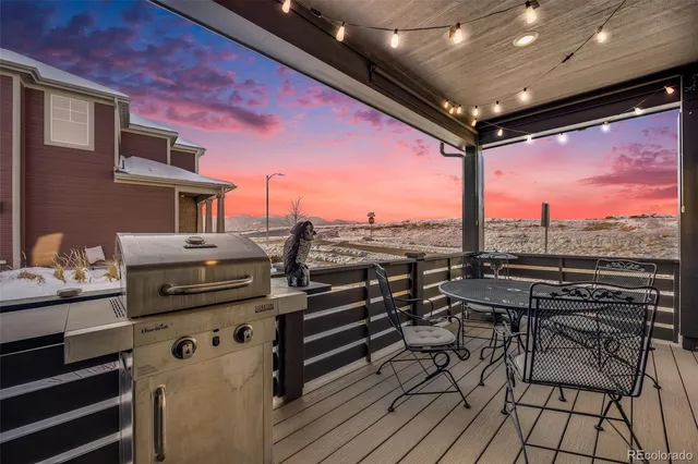 a view of a balcony with chairs