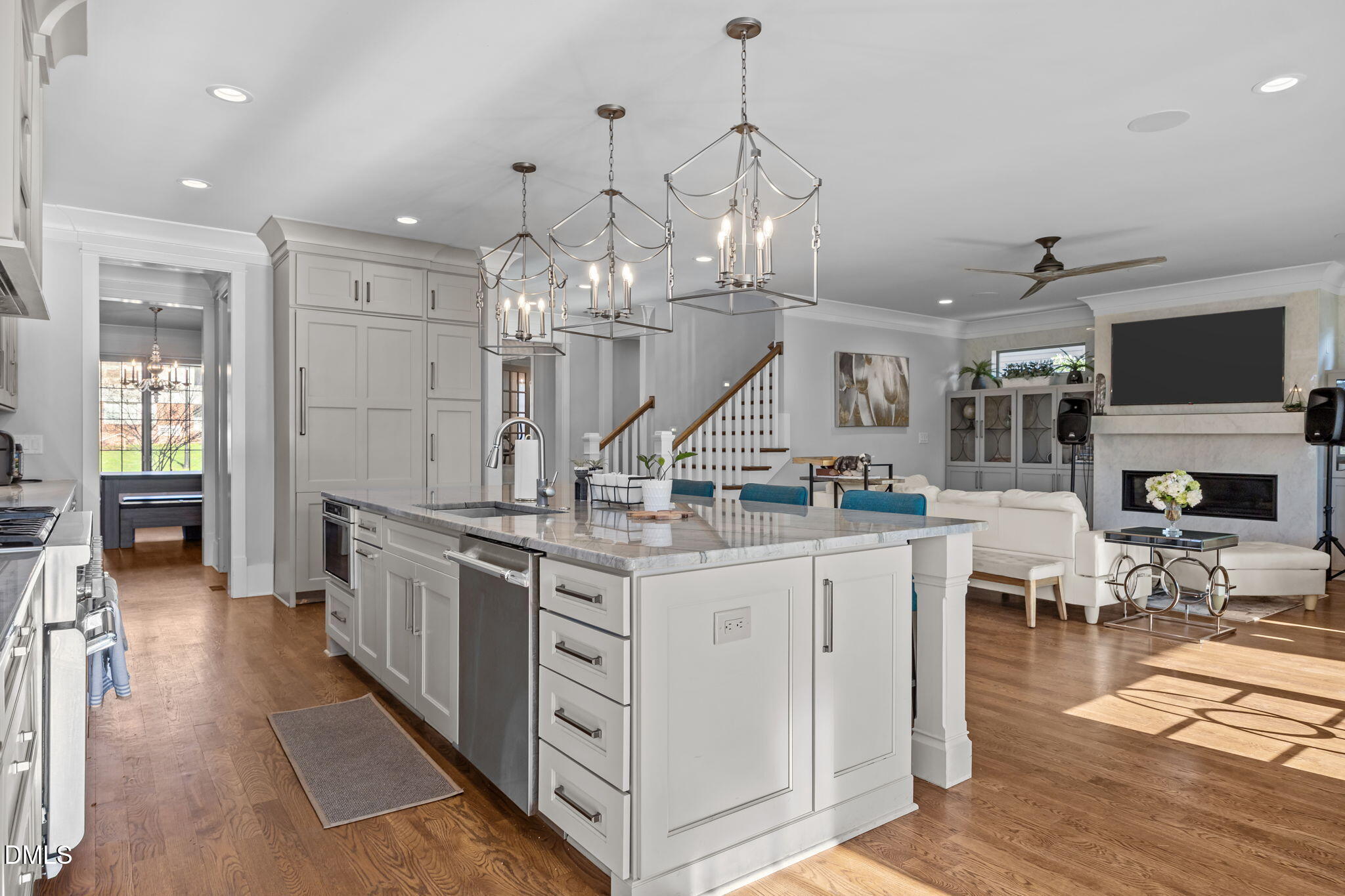 630 Daniels Street Raleigh, NC 27605 - Photo 11 of 34 an open kitchen with sink and cabinets