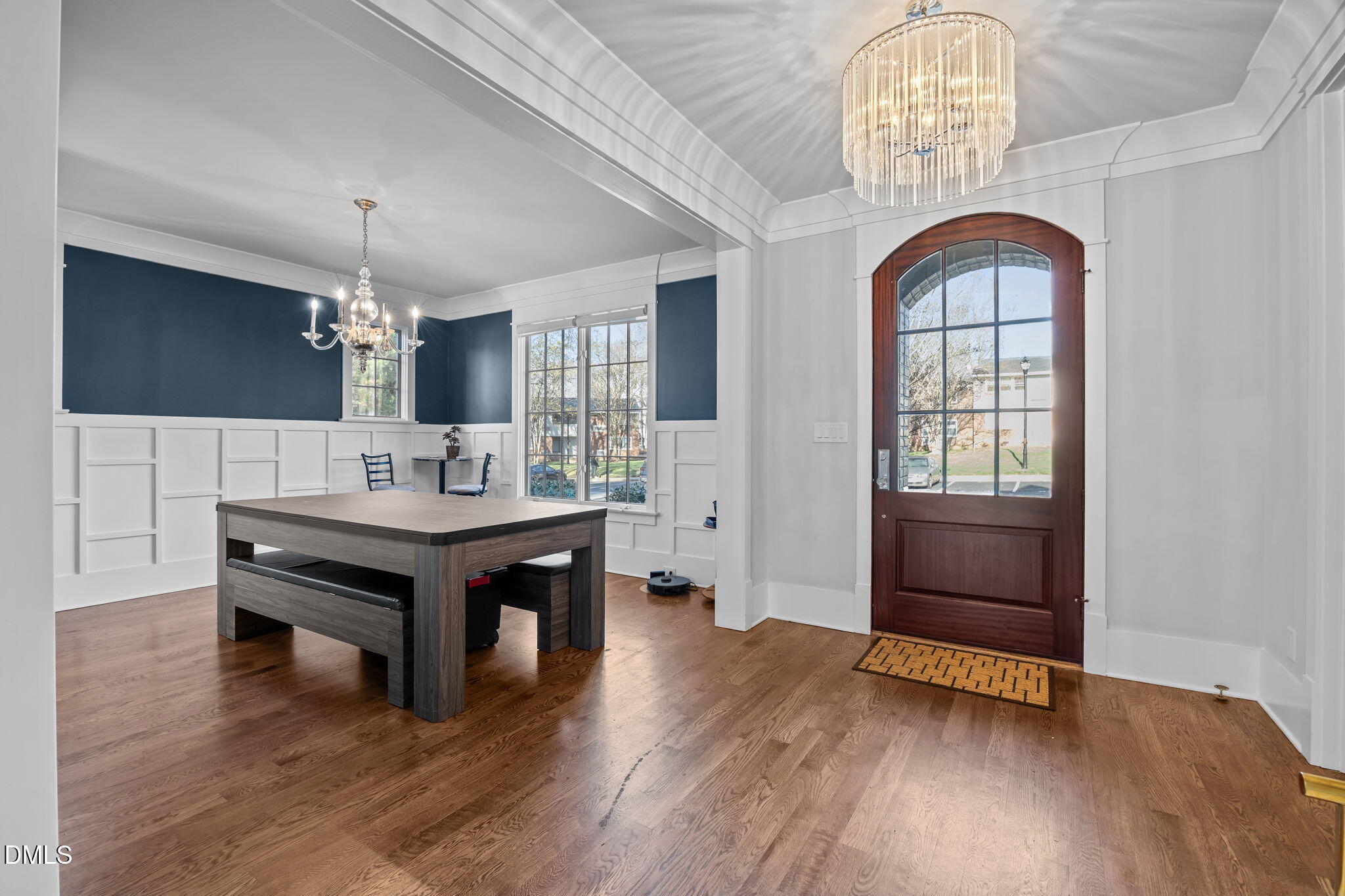 630 Daniels Street Raleigh, NC 27605 - Photo 2 of 34 a living room with wooden floor and furniture