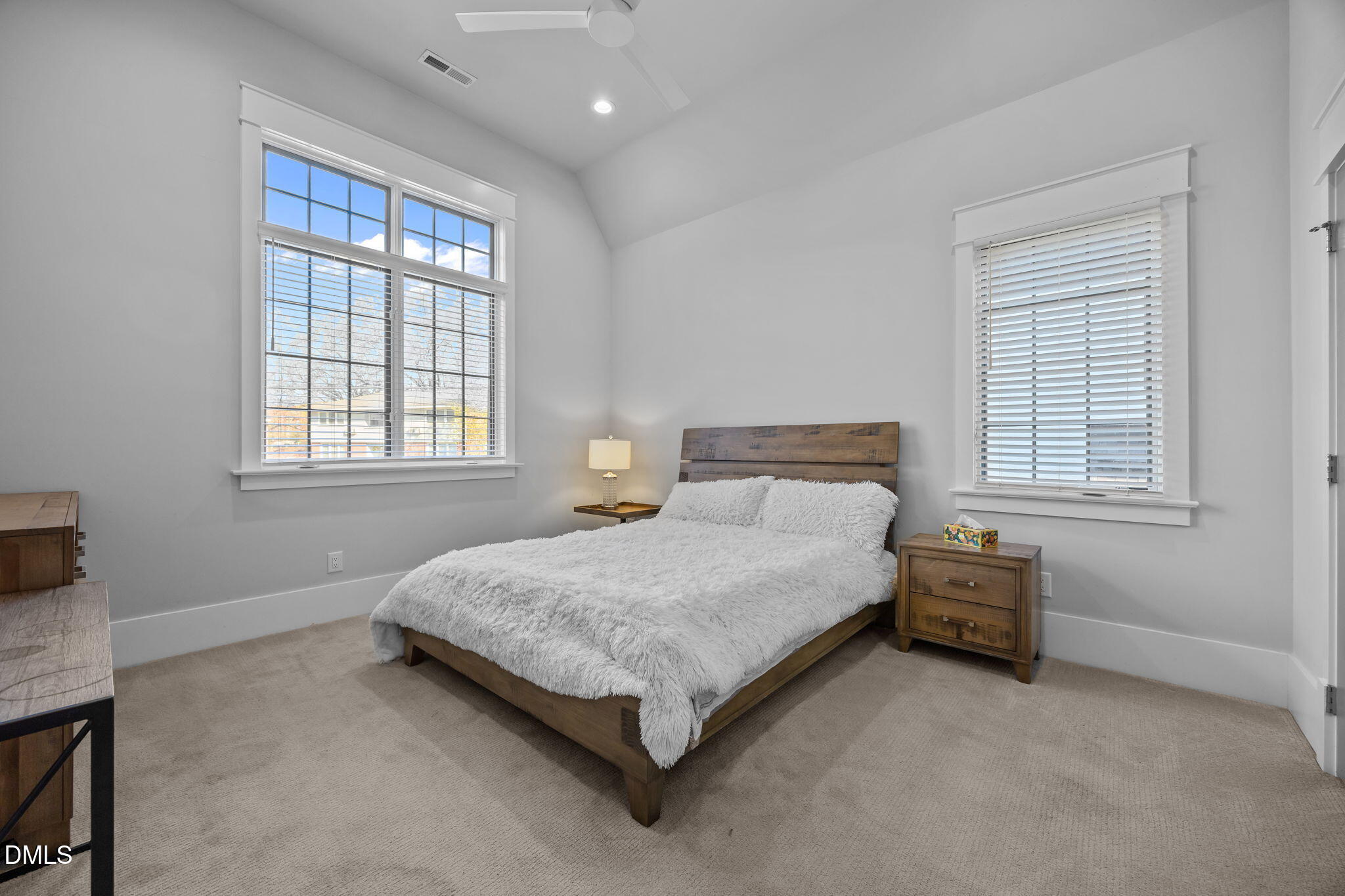 630 Daniels Street Raleigh, NC 27605 - Photo 25 of 34 a bedroom with a bed and a window