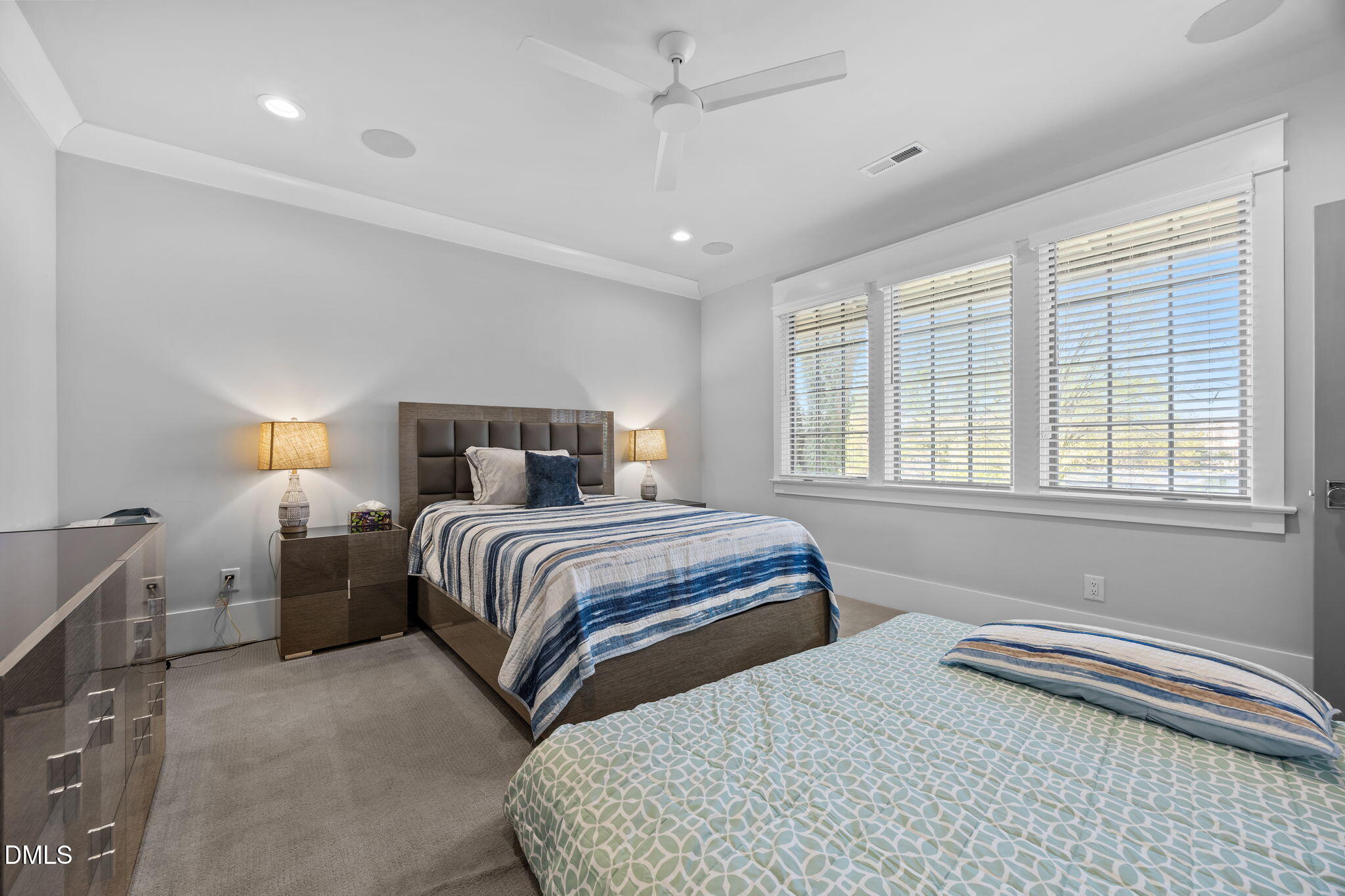 630 Daniels Street Raleigh, NC 27605 - Photo 28 of 34 a bedroom with bed and window