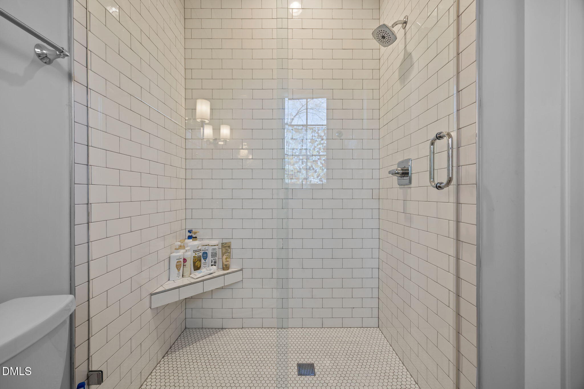 630 Daniels Street Raleigh, NC 27605 - Photo 30 of 34 a bathroom with a shower and toilet