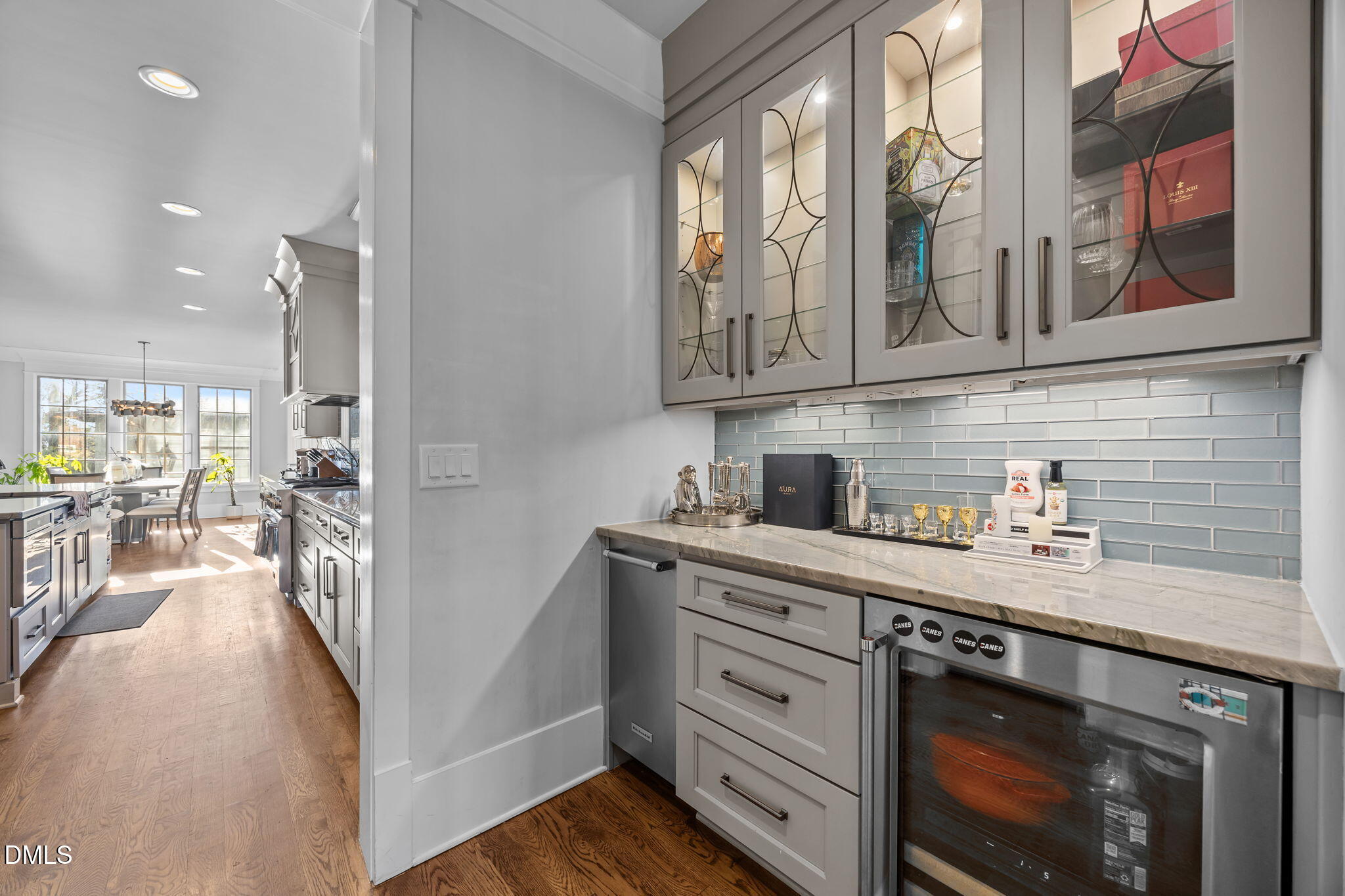 630 Daniels Street Raleigh, NC 27605 - Photo 9 of 34 a kitchen with stainless steel appliances granite countertop a stove a sink and a refrigerator