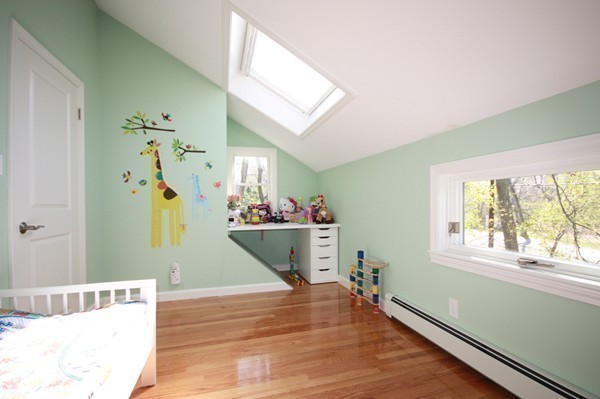 328 Quinobequin Road Newton, MA 02468 - Photo 15 of 22 a view of a room with wooden floor and windows