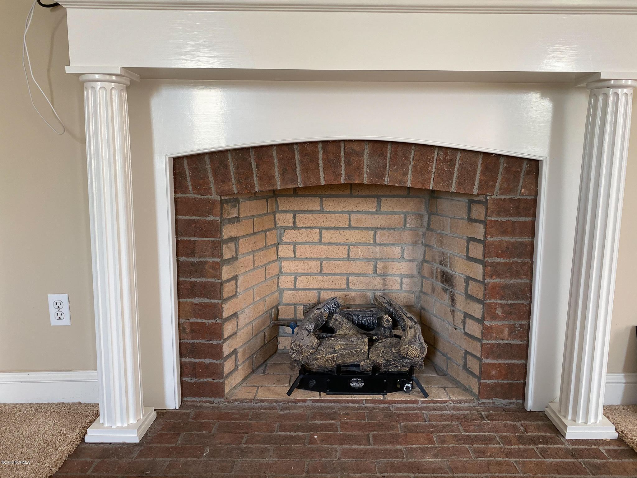 896 Pole Pocosin Road Pollocksville, NC 28573 - Photo 56 of 92 Master Bedroom Fireplace
