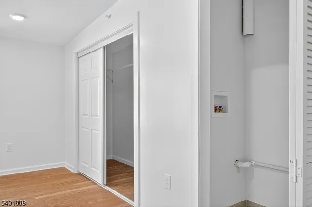 a en suite bathroom with a sink and a mirror