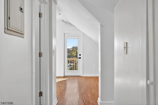 a car parked in front of a white building