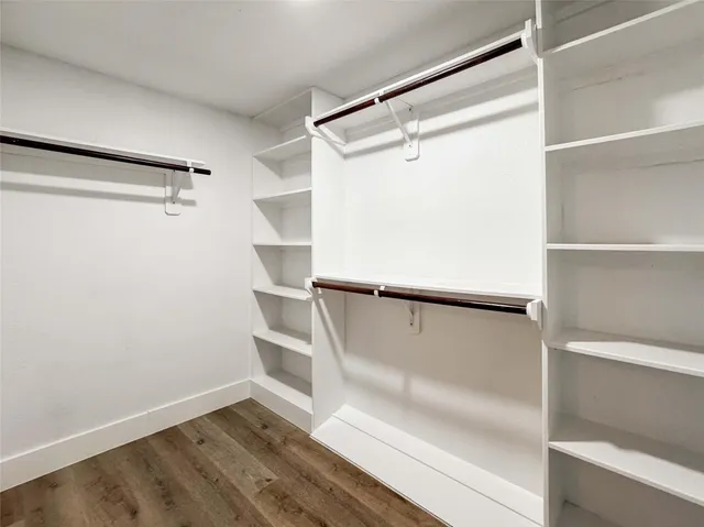 a view of an empty walk in closet