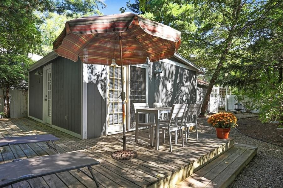 16070 Lakeshore Road Union Pier, MI 49129 - Photo 41 of 49 Cottage Deck with Unbrella