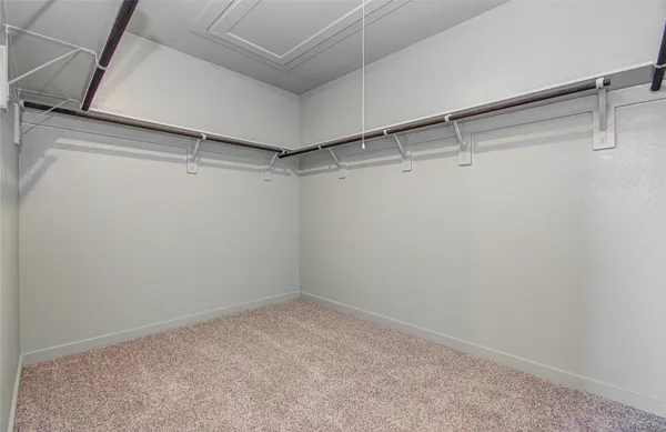 a view of a room with racks on the wall