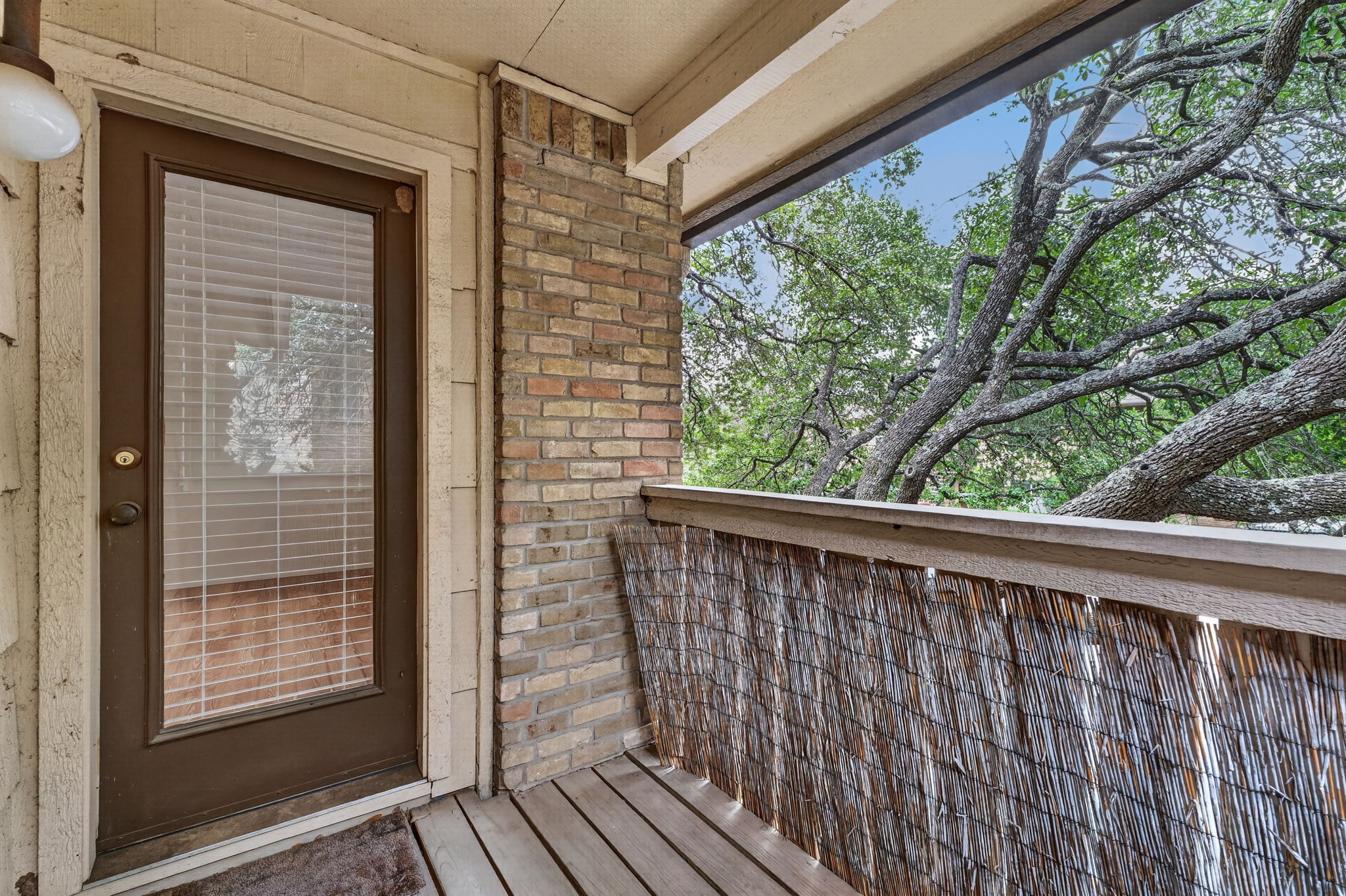 8210 Bent Tree Road, Unit 256 Austin, TX 78759 - Photo 19 of 29 a view of balcony with wooden floor