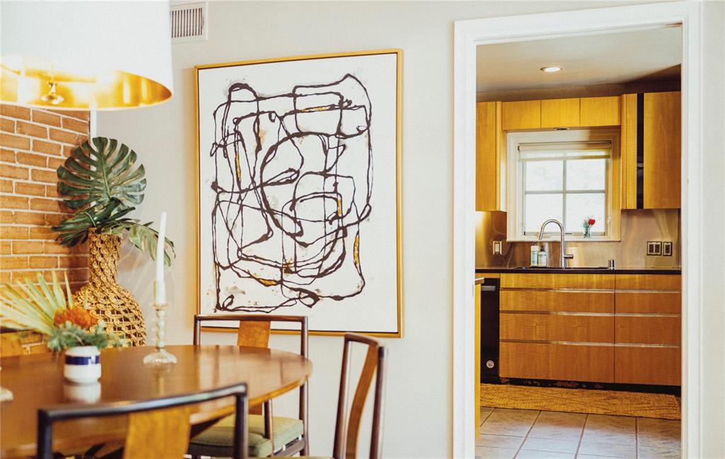 5301 West Mockingbird Lane Dallas, TX 75209 - Photo 17 of 35 a bathroom with a granite countertop sink a mirror and a shower