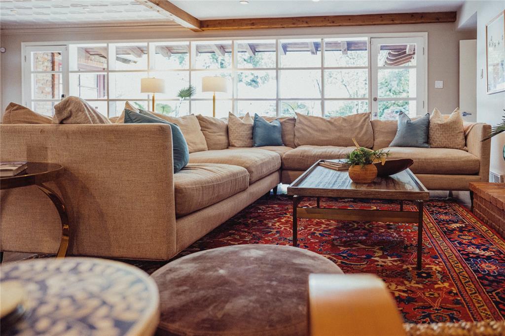 5301 West Mockingbird Lane Dallas, TX 75209 - Photo 18 of 35 a living room with furniture and a large window