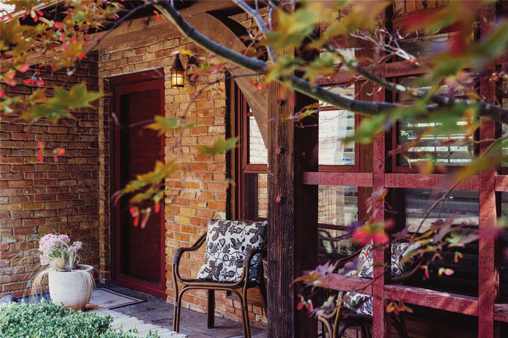 5301 West Mockingbird Lane Dallas, TX 75209 - Photo 22 of 35 a view of a patio with table and chairs and potted plants
