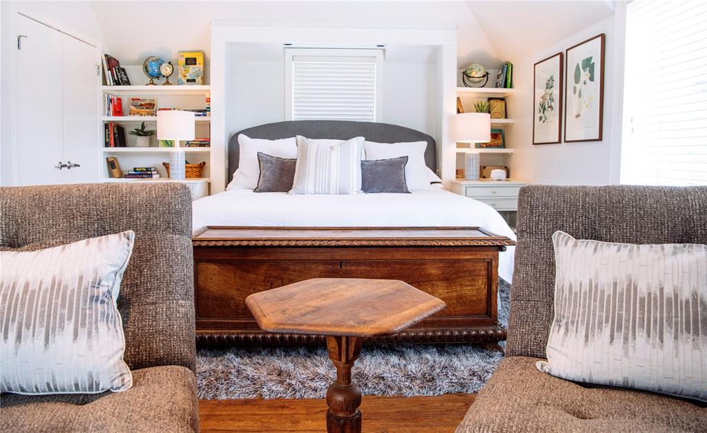 5301 West Mockingbird Lane Dallas, TX 75209 - Photo 24 of 35 a bedroom with a bed and a couch