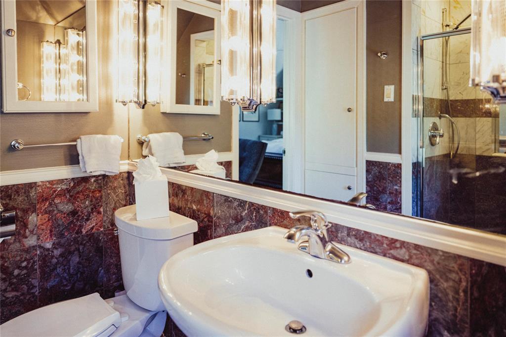 5301 West Mockingbird Lane Dallas, TX 75209 - Photo 27 of 35 a bathroom with a sink and a toilet