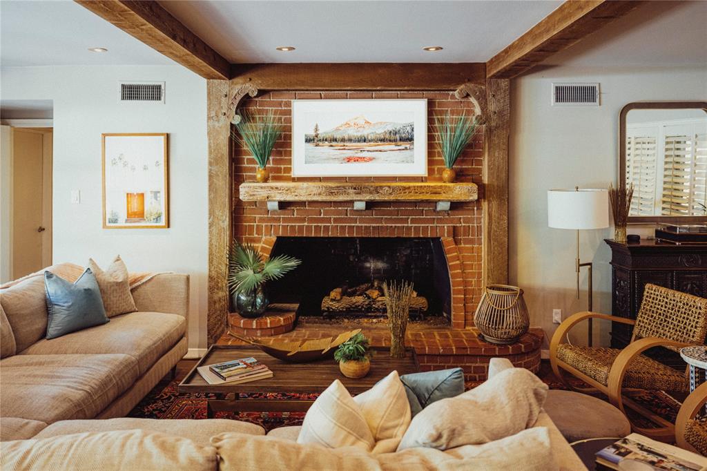 5301 West Mockingbird Lane Dallas, TX 75209 - Photo 4 of 35 a living room with furniture and a fireplace
