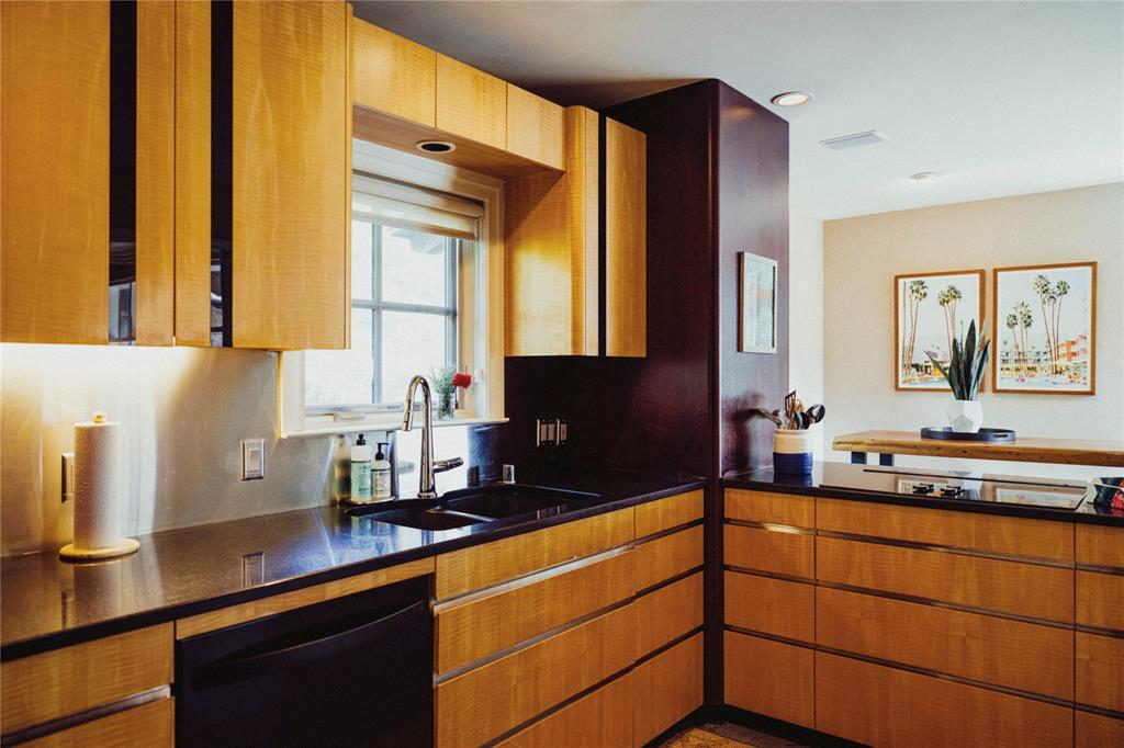 5301 West Mockingbird Lane Dallas, TX 75209 - Photo 5 of 35 a kitchen with a sink and cabinets