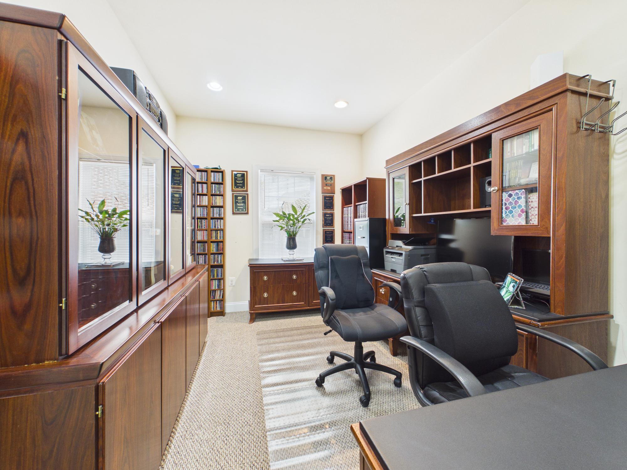 7801 Ridgewood Drive Annandale, VA 22003 - Photo 23 of 72 a work room with furniture and windows