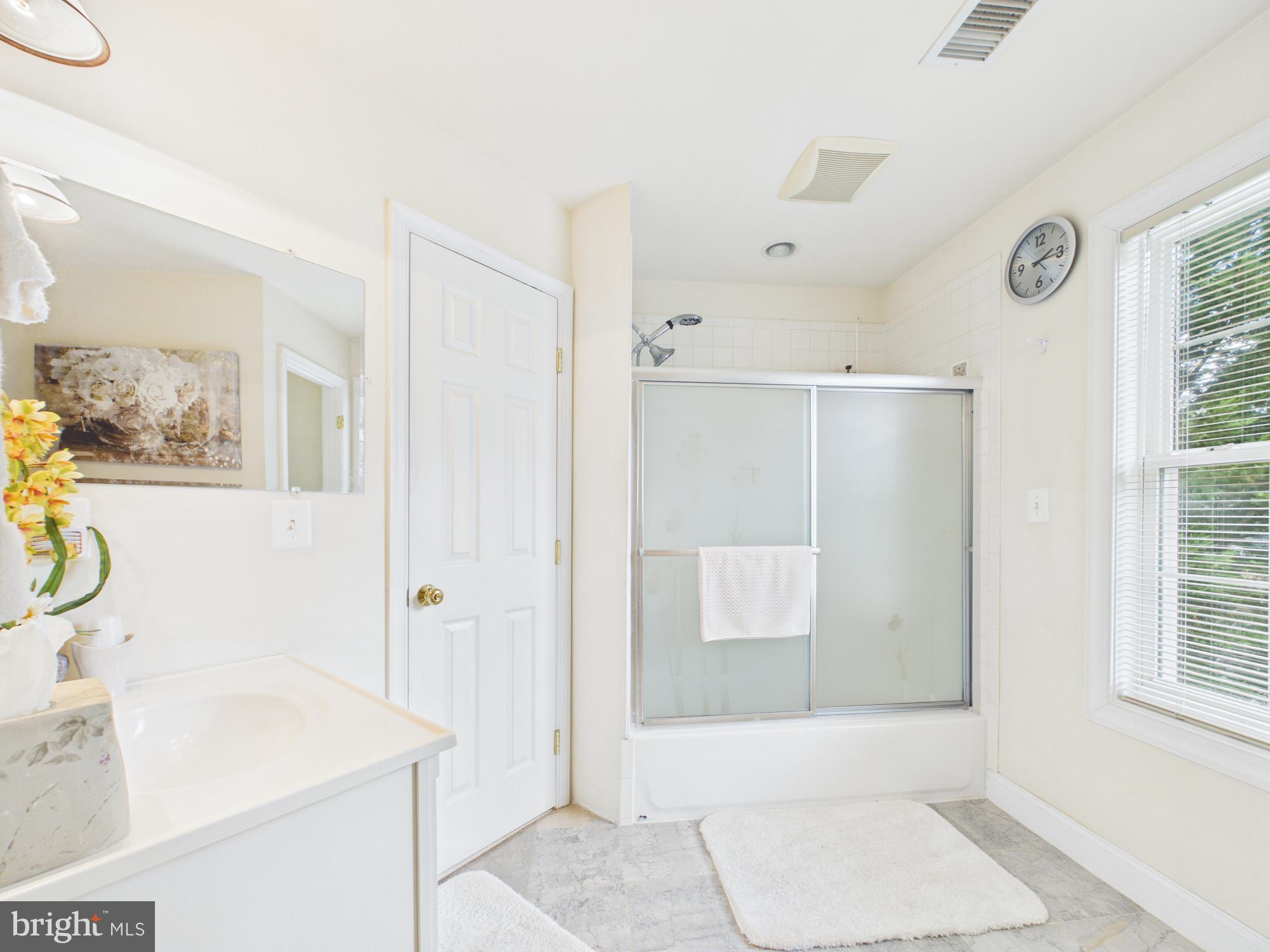 7801 Ridgewood Drive Annandale, VA 22003 - Photo 42 of 72 Bright and airy bathroom retreat.