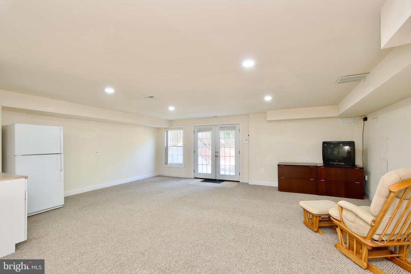 7801 Ridgewood Drive Annandale, VA 22003 - Photo 48 of 72 a view of a livingroom with furniture and windows