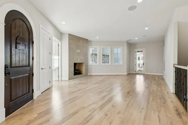 a view of a livingroom with wooden floor