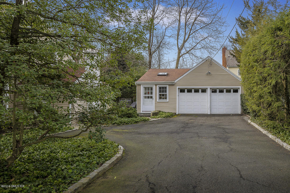 2 Boxwood Lane Greenwich, CT 06830 - Photo 19 of 23 a house with trees in the background