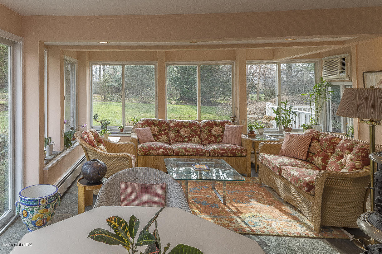 2 Boxwood Lane Greenwich, CT 06830 - Photo 4 of 23 a living room with furniture and a large window