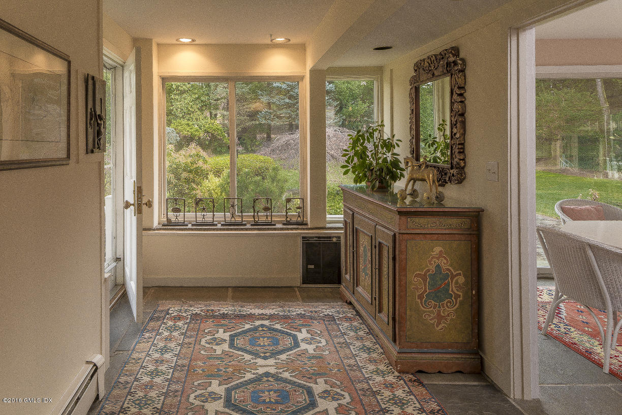 2 Boxwood Lane Greenwich, CT 06830 - Photo 6 of 23 a room with window and a potted plant